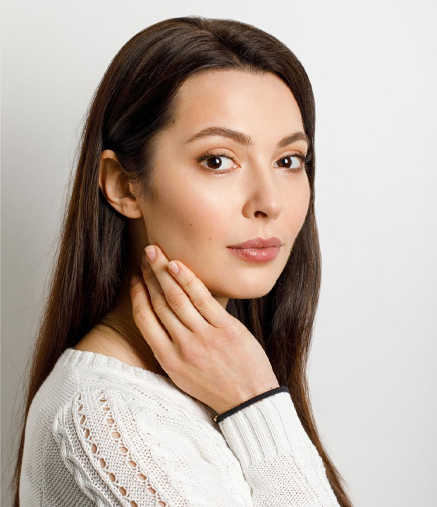 After treatment photo showing clear, healthy skin results at Dr. Thaj Clinic